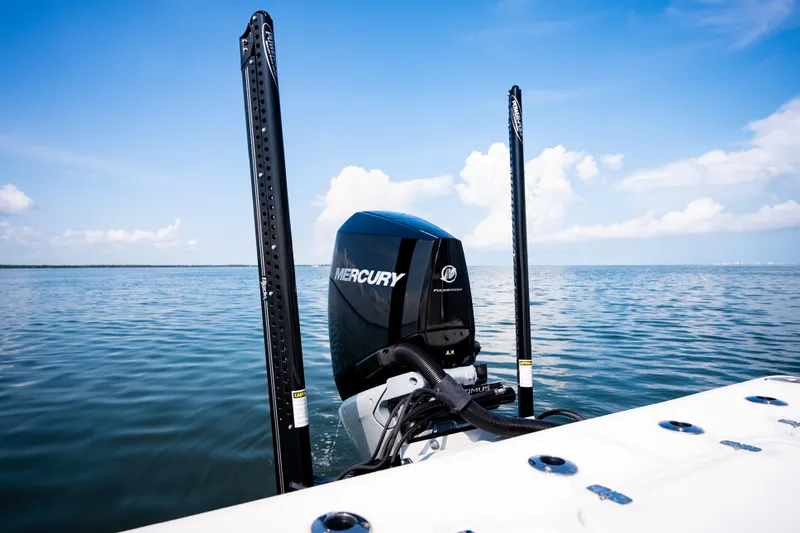 Slide: The Image of 2023 Canyon Bay 28h boat with Mercury engine on calm water. - 50
