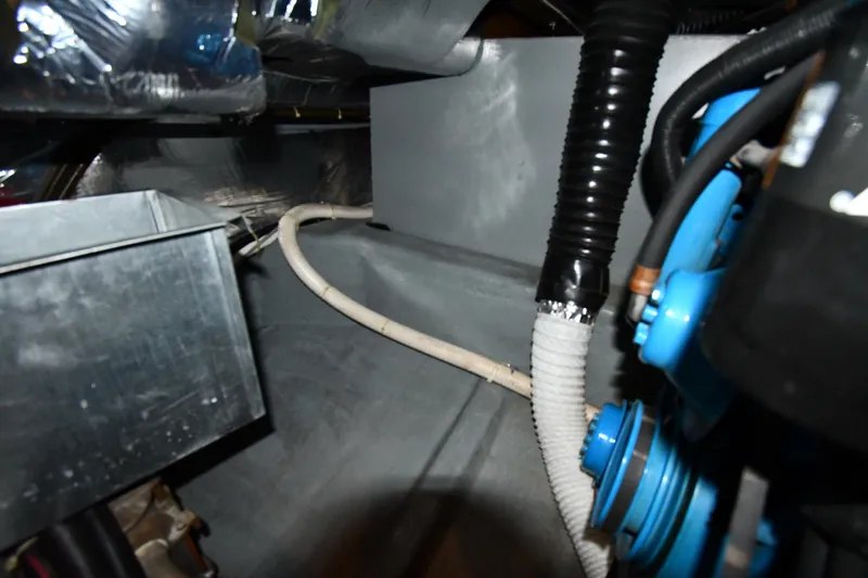 Slide: The Image of Engine compartment of the 1996 Carver 400 Cockpit Motor Yacht. - 49