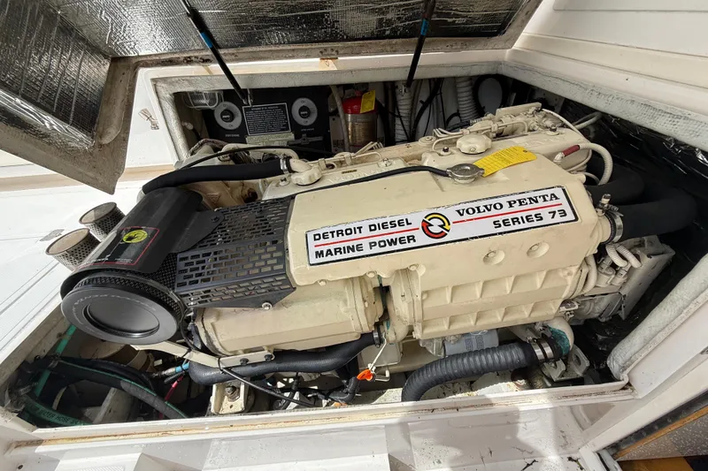 Slide: The Image of Engine compartment of a 1999 Blackfin 33 Flybridge with Volvo Penta Series 73 diesel engine. - 61