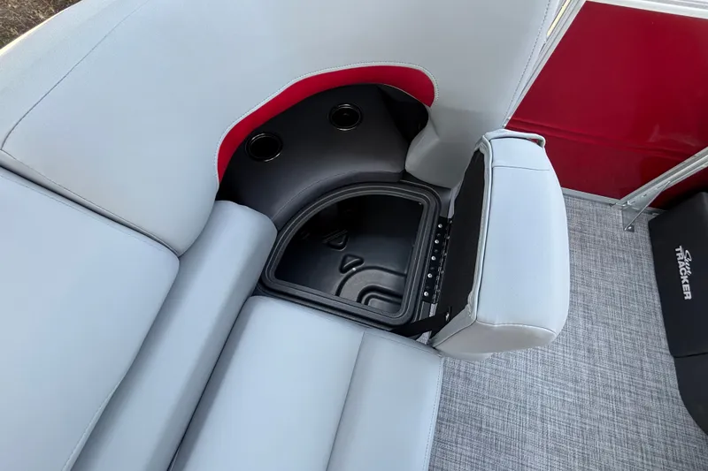 Slide: The Image of 2026 Sun Tracker Party Barge 22 XP3 seating with storage compartment and cup holders. - 13