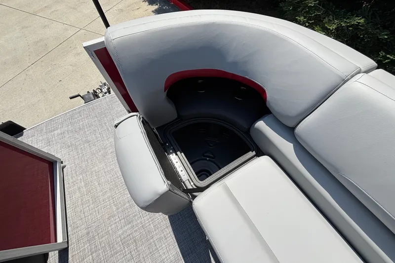 Slide: The Image of 2026 Sun Tracker Party Barge 22 XP3 with open storage compartment on deck. - 31