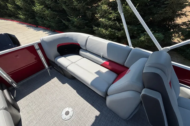 Slide: The Image of 2026 Sun Tracker Party Barge 22 XP3 interior with gray and red seating. - 44