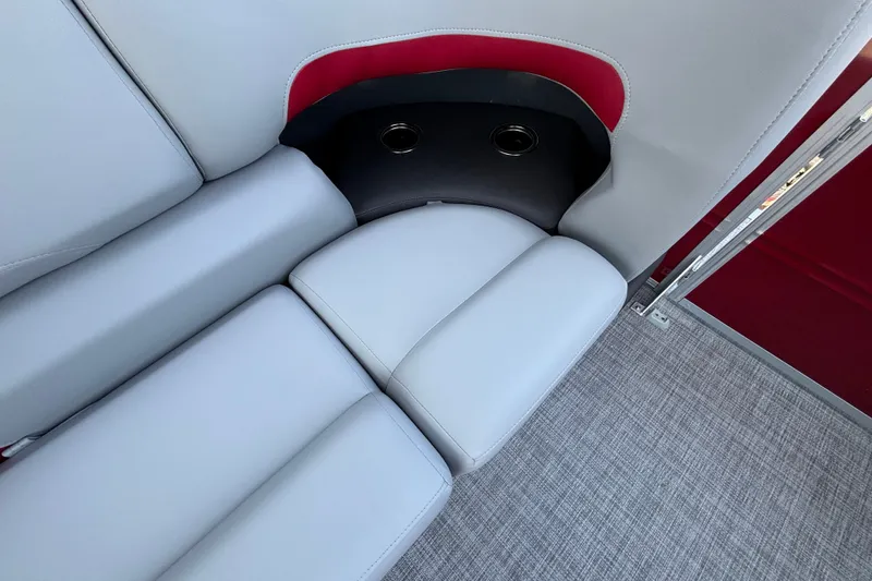 Slide: The Image of 2026 Sun Tracker Party Barge 22 XP3 interior seating with cup holders. - 20