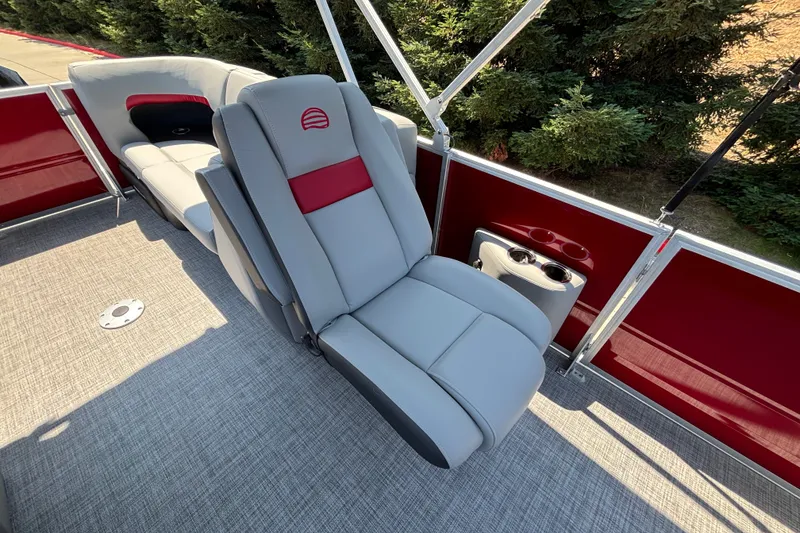 Slide: The Image of 2026 Sun Tracker Party Barge 22 XP3 interior with comfortable seating and cup holders. - 45