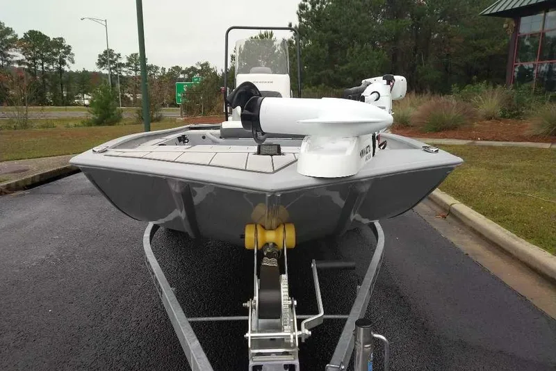 Slide: The Image of 2026 Tracker Bass Tracker Classic CC boat on trailer, parked outdoors. - 4