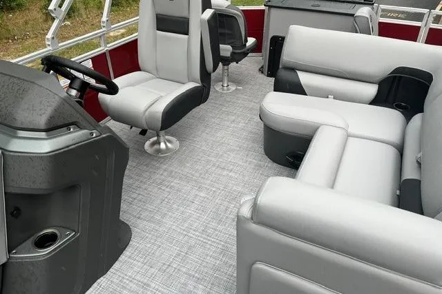 Slide: The Image of 2026 Sun Tracker SportFish 20 DLX interior with gray seating and modern design. - 11