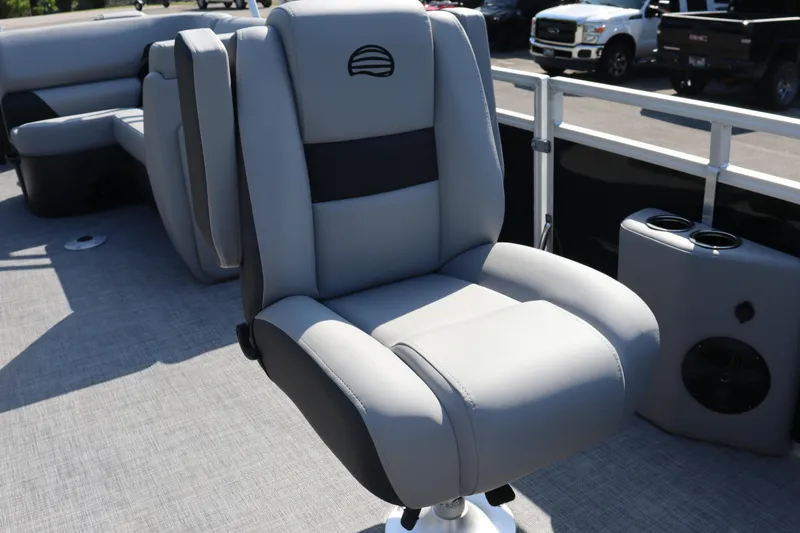 Slide: The Image of 2026 Sun Tracker SportFish 20 DLX boat seat with cup holders and speaker. - 7