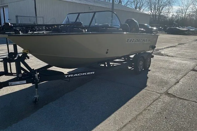 Slide: The Image of 2026 Tracker Targa V-19 Combo boat on trailer in outdoor setting. - 70