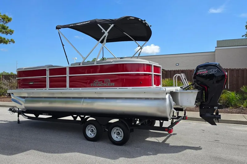 Slide: The Image of 2026 Sun Tracker Party Barge 20 DLX pontoon boat with canopy and Mercury Pro XS engine. - 9
