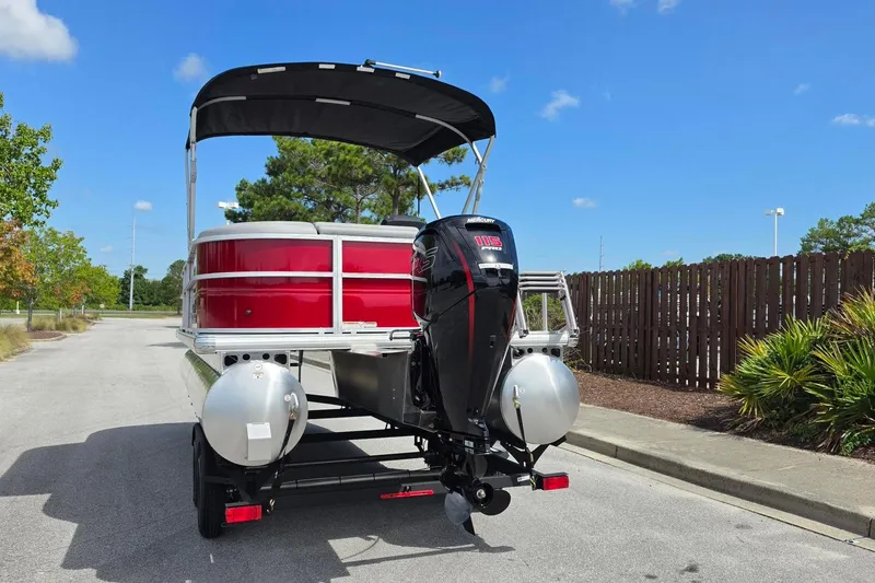 Slide: The Image of 2026 Sun Tracker Party Barge 20 DLX pontoon boat with Mercury outboard motor. - 10