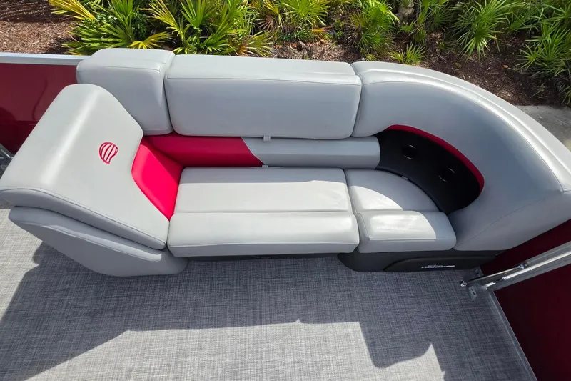 Slide: The Image of 2026 Sun Tracker Party Barge 20 DLX pontoon boat with stylish gray and red seating. - 15