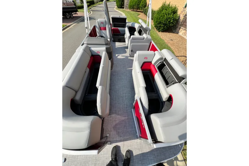 Slide: The Image of 2026 Sun Tracker Party Barge 20 DLX interior with spacious seating and modern design. - 10