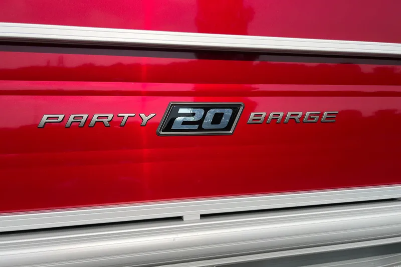 Slide: The Image of 2026 Sun Tracker Party Barge 20 DLX logo on red background. - 4