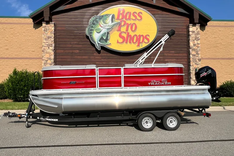 The Image of 2026 Sun Tracker Party Barge 20 DLX pontoon boat at Bass Pro Shops. - 1