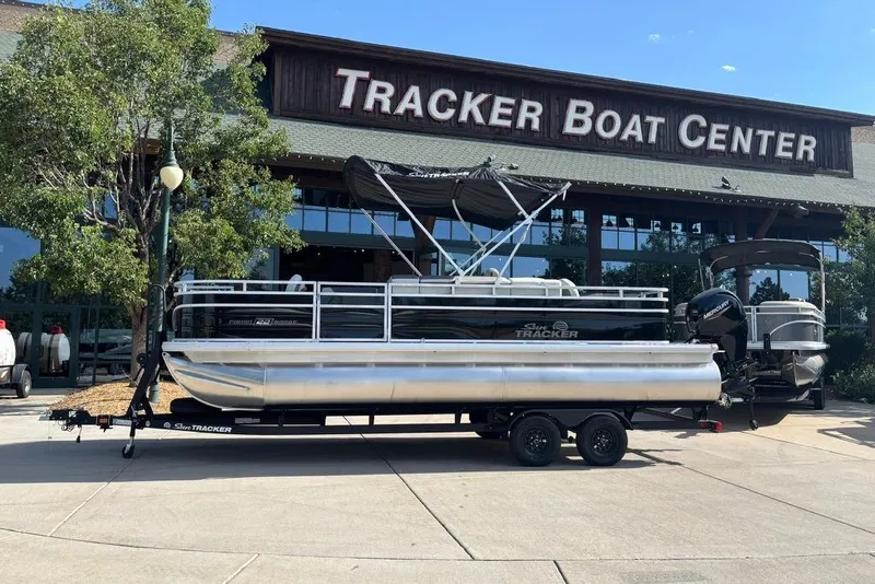 The Image of 2026 Sun Tracker Fishin' Barge 22 DLX pontoon boat at Tracker Boat Center. - 0