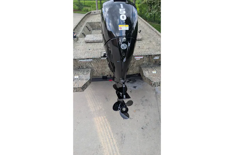 Slide: The Image of 2026 Tracker Grizzly 2072 CC boat with powerful 150 HP outboard motor. - 8