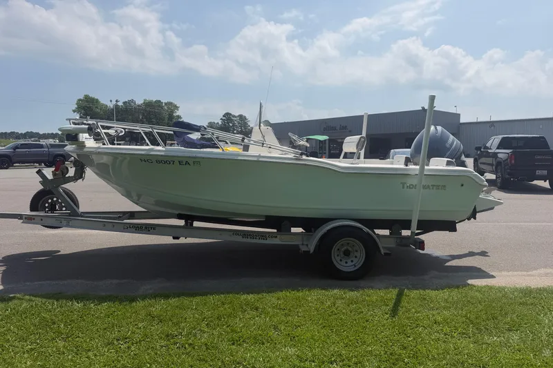 Slide: The Image of 2015 Tidewater 180 CC Adventure boat on trailer in parking lot. - 3