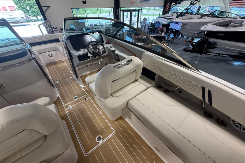 Slide: The Image of Luxurious interior of a 2027 Regal LS9 boat, featuring elegant seating and modern design. - 11