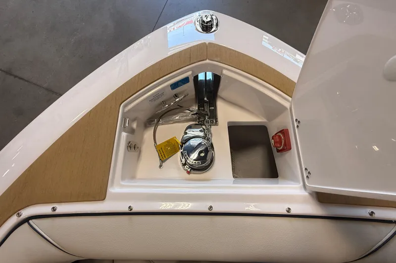 Slide: The Image of Open storage compartment on 2027 Regal LS9 boat, featuring modern design and equipment. - 18