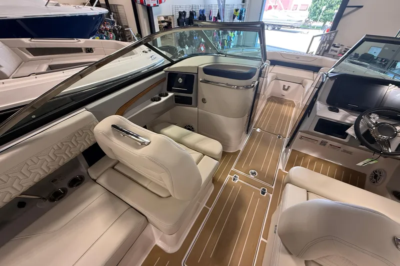 Slide: The Image of Luxurious interior of 2027 Regal LS9 boat with elegant seating and modern dashboard. - 12