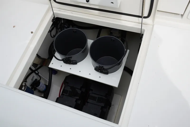 Slide: The Image of Open hatch of 2027 Regulator 31 boat showing internal components and storage. - 5