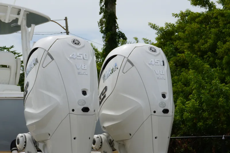 Slide: The Image of Twin Yamaha 450 V8 outboard engines on a 2027 Regulator 31 boat. - 1