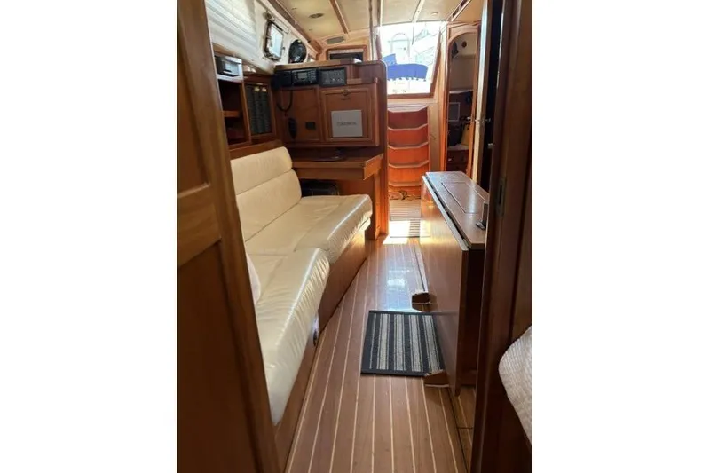 Slide: The Image of Interior of 2002 Saga 43 yacht with wooden flooring and comfortable seating. - 22