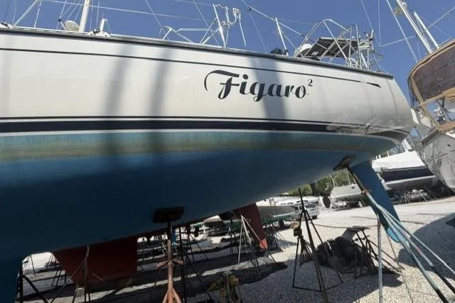 Slide: The Image of Saga 43 sailboat named Figaro² on stands, 2002 model, in a boatyard. - 43