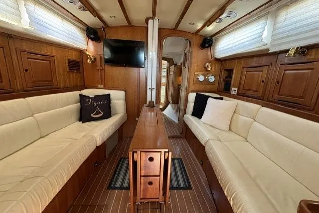 Slide: The Image of Luxurious interior of 2002 Saga 43 yacht with elegant wood finish and plush seating. - 20