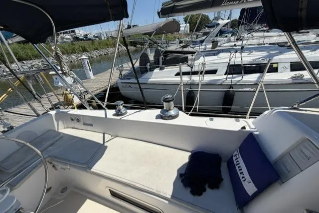 Slide: The Image of Cockpit view of a 2002 Saga 43 sailboat docked at a marina. - 8