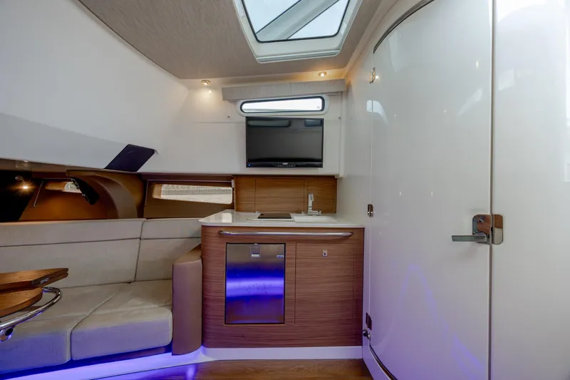 Slide: The Image of Luxurious interior of 2017 Boston Whaler 420 Outrage with modern amenities and sleek design. - 35