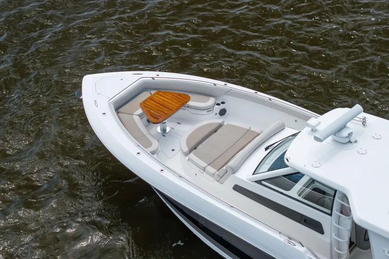 Slide: The Image of 2017 Boston Whaler 420 Outrage boat with sleek design and comfortable seating on water. - 7
