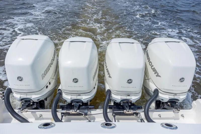 Slide: The Image of Four Mercury outboard engines on a 2017 Boston Whaler 420 Outrage boat. - 73