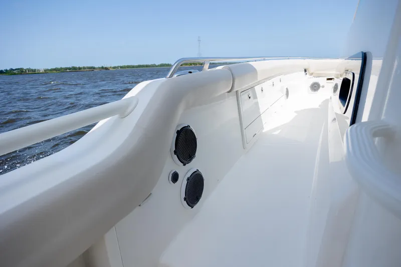 Slide: The Image of 2017 Boston Whaler 420 Outrage boat deck with sleek design and ocean view. - 56