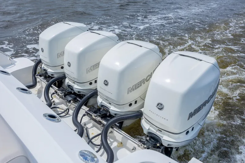 Slide: The Image of Four Mercury outboard engines on a 2017 Boston Whaler 420 Outrage boat. - 74