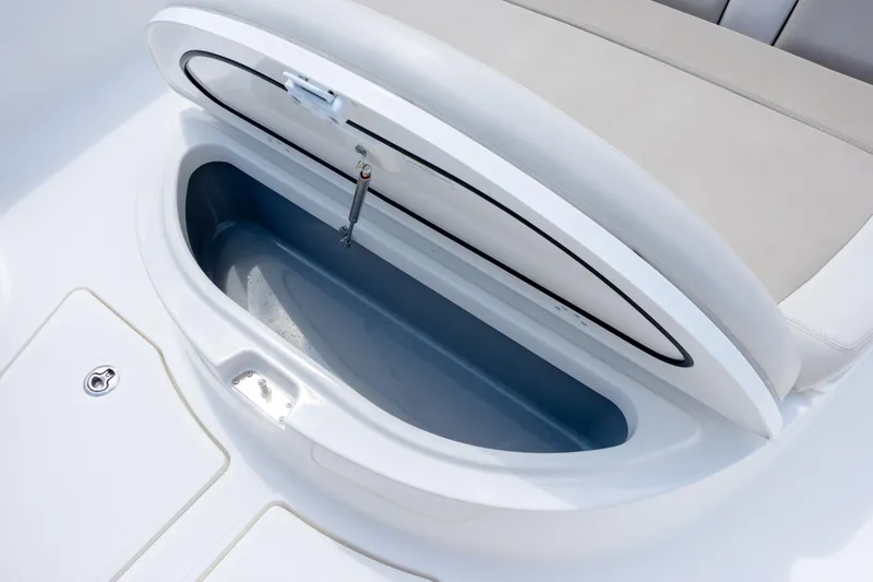 Slide: The Image of Open storage compartment on 2017 Boston Whaler 420 Outrage boat, showcasing sleek design. - 60