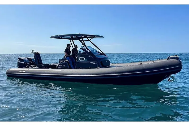 Slide: The Image of Manufacturer Provided Image: 2026 Brig Eagle 10 boat on open water, featuring sleek design and dual Suzuki engines. - 1