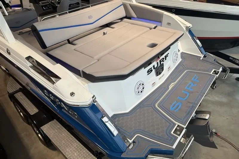 Slide: The Image of 2026 Cobalt R4 Surf boat with sleek design and spacious seating. - 9