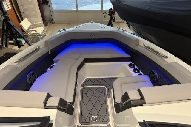 Slide: The Image of 2026 Cobalt R6 boat interior with blue LED lighting and luxurious seating. - 3