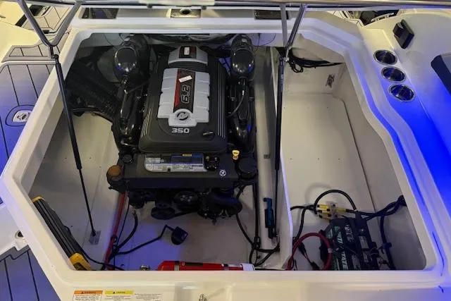 Slide: The Image of Engine compartment of 2026 Cobalt R6 boat, featuring a 6.2L 350 horsepower engine. - 10