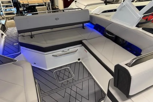 Slide: The Image of Luxurious seating area on a 2026 Cobalt R6 boat with modern design and ambient lighting. - 5