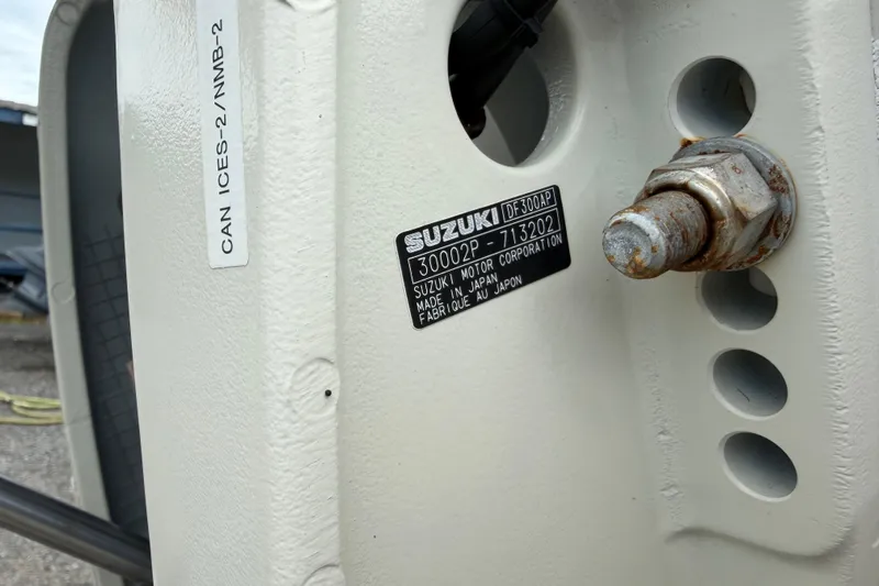 Slide: The Image of Close-up of a Suzuki DF300AP engine label on a Duskey 256, 2007 model. - 23