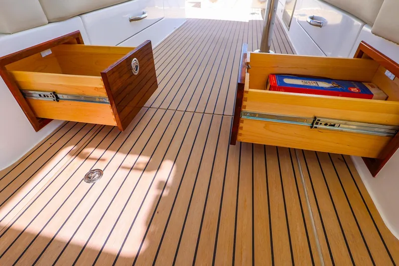 Slide: The Image of Open wooden drawers on MJM 3z boat, 2022 model, with teak flooring. - 36