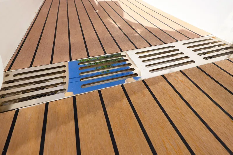 Slide: The Image of Teak deck of 2022 MJM 3z boat with stainless steel drainage grates. - 34
