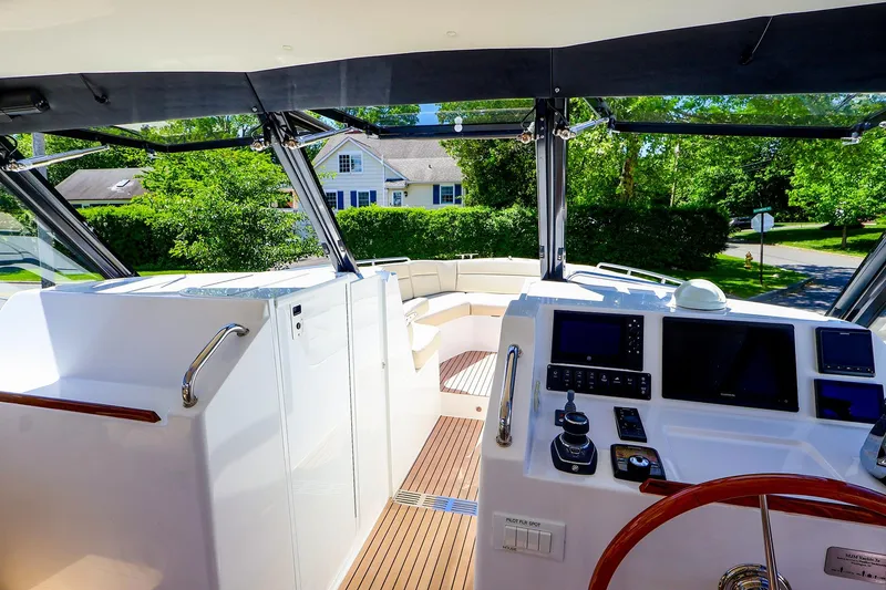 Slide: The Image of Cockpit view of 2022 MJM 3z yacht with modern controls and seating area. - 15