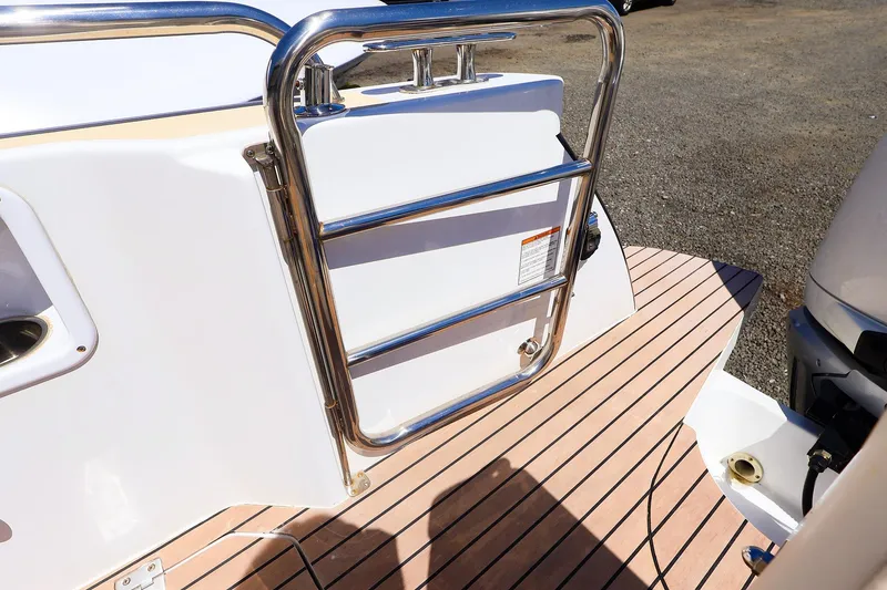 Slide: The Image of Stainless steel ladder on MJM 3z boat, 2022 model, with teak deck. - 42