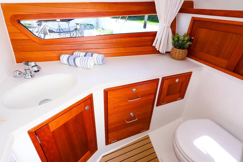 Slide: The Image of Luxurious 2022 MJM 3z yacht bathroom with wooden cabinets and modern fixtures. - 46