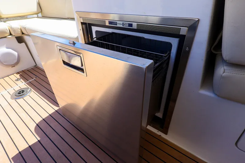 Slide: The Image of Luxury yacht MJM 3z 2022 with open stainless steel refrigerator on teak deck. - 22