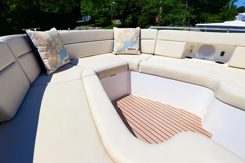 Slide: The Image of Luxurious seating area on 2022 MJM 3z boat with map-themed cushions. - 24