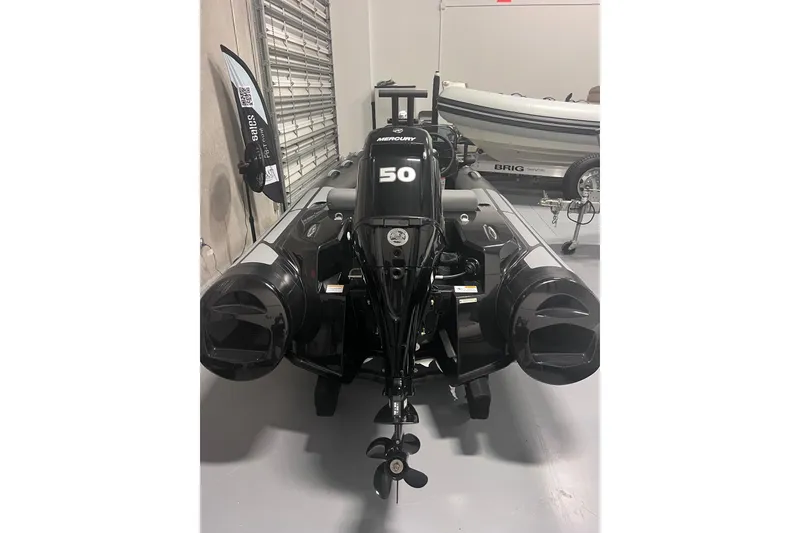 Slide: The Image of 2026 Brig Eagle 4 inflatable boat with Mercury 50 engine in showroom. - 5